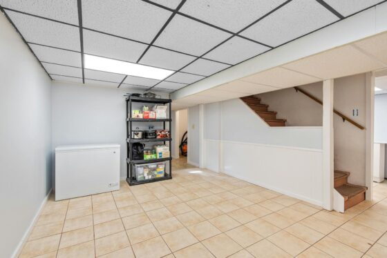 featured image - Basement Flooring Options: Carpet vs Tile vs Vinyl